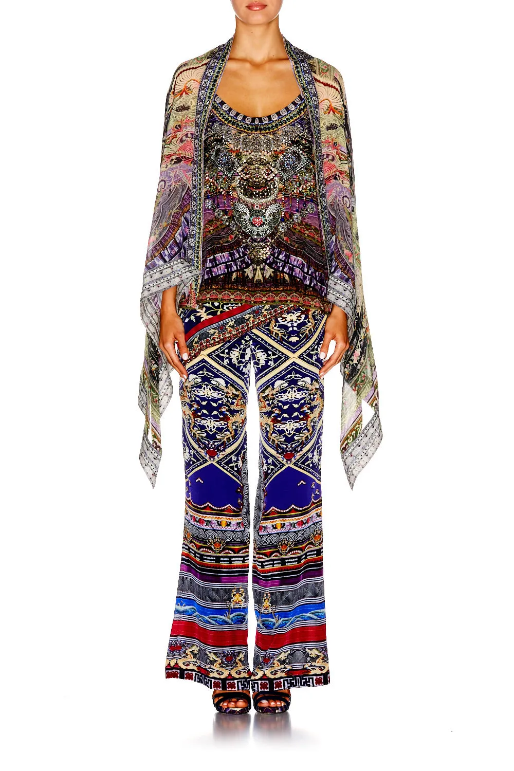 LAYERING PIECE WITH HIGH LOW HEM THREADS THAT BIND US